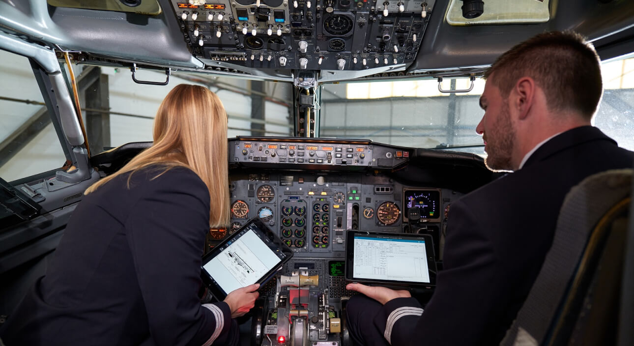 West Atlantic pilot in a cockpit, showcasing improved safety and communication through 5G connectivity.